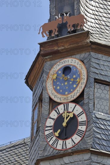 Lancet turret with astronomical clock and heraldic animal of town hall, roof, building, landmark, figures, moon clock, animal figures, ox figure, detail, New Town Hall, Ochsenfurt, Lower Franconia, Franconia, Bavaria, Germany