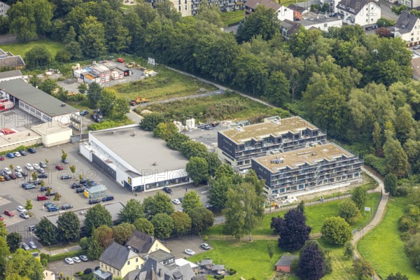 Aerial view, construction site with new residential quarter An der Schlacht, behind Lidl supermarket on the river Ruhr, Obereimer, Arnsberg, Ruhr area, North Rhine-Westphalia, Germany, construction work, construction area, construction site, building plots, construction project, construction site, DE, Europe, property tax, real estate, aerial photograph, aerial photography, aerial photography, new construction, overview, bird's eye view, residential complex, living and living, residential area, residential quality, residential quarter, housing estate, residential area, birds-eyes view, overview