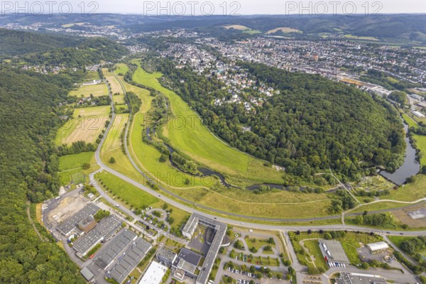 Aerial view, old town with river Ruhr Ruhrbogen at the forest area Eichholz, weir and camel bridge at the river Ruhr Ruhraue, commercial area Altes Feld, distant view, Arnsberg, Ruhr area, North Rhine-Westphalia, Germany, DE, Europe, commercial enterprises, commercial area, commercial property, commercial park, commercial location, commercial use, property tax, real estate, industrial area, industrial location, aerial view, aerial photography, aerial photography, overview, bird's-eye view, forest, forest area, residential area, housing and living, residential area, residential quality, residential neighbourhood, housing estate, residential area, birds-eyes view, overview