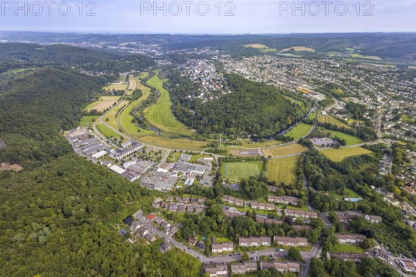 Aerial view, old town with river Ruhr Ruhrbogen at the forest area Eichholz, weir and camel bridge at the river Ruhr Ruhraue, commercial area Altes Feld, distant view, Arnsberg, Ruhr area, North Rhine-Westphalia, Germany, DE, Europe, commercial enterprises, commercial area, commercial property, commercial park, commercial location, commercial use, property tax, real estate, industrial area, industrial location, aerial view, aerial photography, aerial photography, overview, bird's-eye view, forest, forest area, residential area, housing and living, residential area, residential quality, residential neighbourhood, housing estate, residential area, birds-eyes view, overview