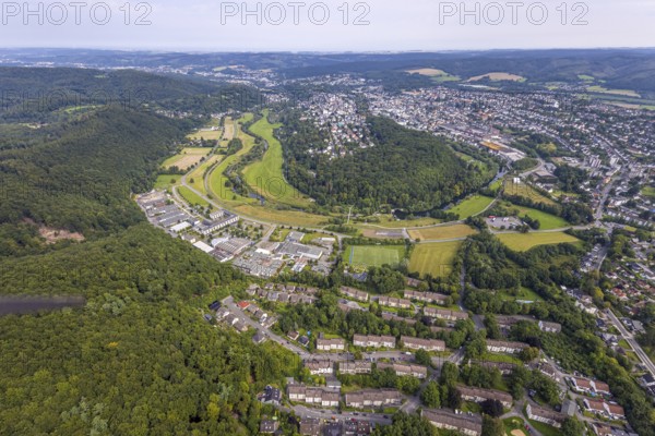 Aerial view, old town with river Ruhr Ruhrbogen at the forest area Eichholz, weir and camel bridge at the river Ruhr Ruhraue, commercial area Altes Feld, distant view, Arnsberg, Ruhr area, North Rhine-Westphalia, Germany, DE, Europe, commercial enterprises, commercial area, commercial property, commercial park, commercial location, commercial use, property tax, real estate, industrial area, industrial location, aerial view, aerial photography, aerial photography, overview, bird's-eye view, forest, forest area, residential area, housing and living, residential area, residential quality, residential neighbourhood, housing estate, residential area, birds-eyes view, overview