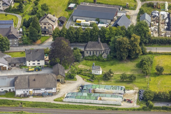 Aerial view, residential area Casparistraße and Im Ruhrbruch, railway line, small chapel and church St. Joseph Kapelle Uentrop, Uentrop, Arnsberg, Ruhr area, North Rhine-Westphalia, Germany, place of worship, DE, Europe, religious community, place of worship, holy place, church, parish, denomination, aerial view, aerial photography, aerial photography, religion, religious site, overview, bird's-eye view, overview