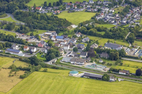 Aerial view, residential area Casparistraße and Im Ruhrbruch, railway line, small chapel and church St. Joseph Kapelle Uentrop, Uentrop, Arnsberg, Ruhr area, North Rhine-Westphalia, Germany, place of worship, DE, Europe, religious community, place of worship, holy place, church, parish, denomination, aerial view, aerial photography, aerial photography, religion, religious site, overview, bird's-eye view, overview