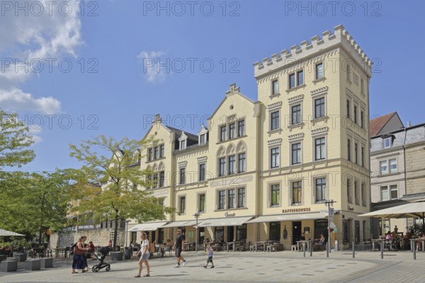 Neo-Gothic building with battlements of the former Weiß candy factory, pedestrian, Albertsplatz, Coburg, Upper Franconia, Franconia, Bavaria, Germany