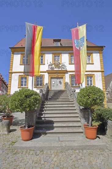 Baroque town hall built in 1739 with German national flag and town flag, open staircase, entrance, town hall square, Winterhausen, Eibelstadt, Lower Franconia, Franconia, Bavaria, Germany