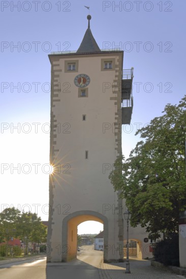 Lower tower built in 1234 in backlight, historical town tower, town gate, light mood, Haßfurt, Lower Franconia, Franconia, Bavaria, Germany