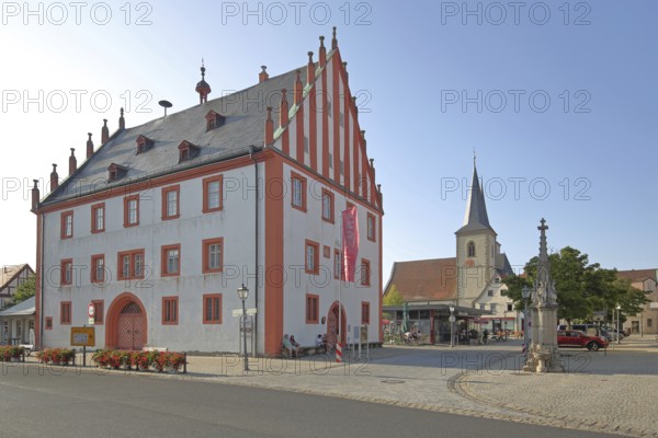 Old town hall built in 1719 with stepped gable and St Kilian's Church, market square, Haßfurt, Lower Franconia, Franconia, Bavaria, Germany