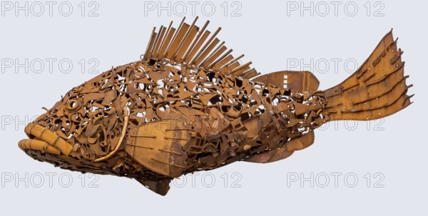 Rusty fish sculpture isolated in light back