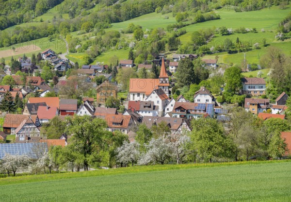 Idyllic sunny spring time scenery including a town named Kocherstetten located in Hohenlohe, a district in Southern Germany