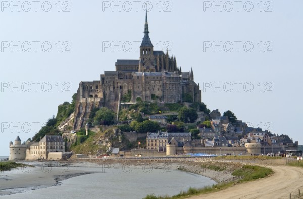 The Mont Saint Michel Abbey in Lower Normandy France at evening time