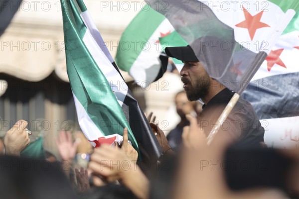 Thousands of Syrians march in Idlib carrying the Syrian revolutionary flag during a protest against international calls to normalize relations with Bashar al-Assad's regime. Aleppo, Syria. July 2, 2024, Aleppo, Aleppo, Syria