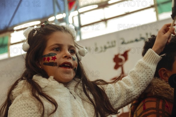 Syrians are seen demonstrating against the rule of Bashar al-Assad while carrying banners and the Syrian revolutionary flag during anti-government protests. Aleppo, Syria. July 30, 2016, Aleppo, Azaz, Syria