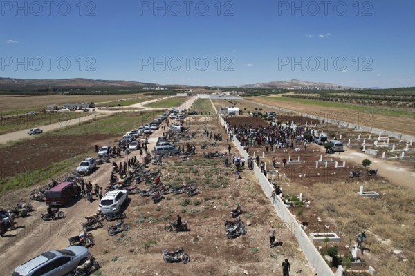 Thousands of Syrians march in Idlib carrying the Syrian revolutionary flag during a protest against international calls to normalize relations with Bashar al-Assad's regime. Aleppo, Syria. July 2, 2024, Aleppo, Aleppo, Syria