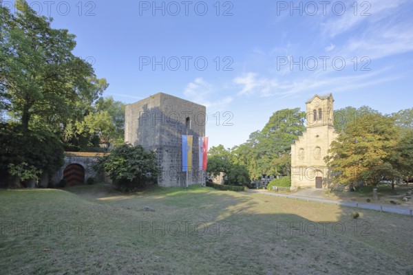 Inner courtyard with St Boniface's Chapel built in the 11th century and town flag, Salzburg Castle, Bad Neustadt an der Saale, Rhön, Lower Franconia, Franconia, Bavaria, Germany