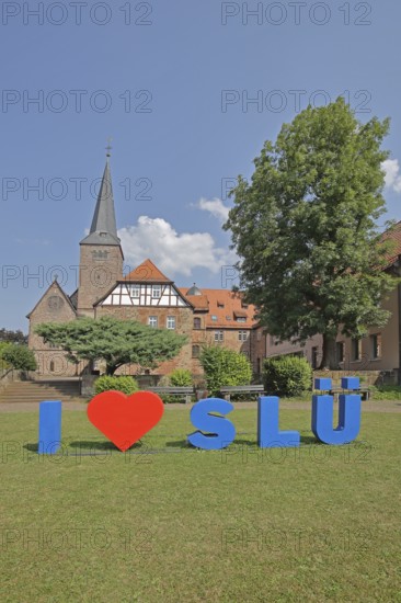 Heart sign as a symbol of solidarity and love for the city of SLÜ, monastery, church tower, decoration, heart-shaped, shape, I, i, three, letters, love, Schlüchtern, Schlüchtern, Vogelsberg, Hesse, Germany