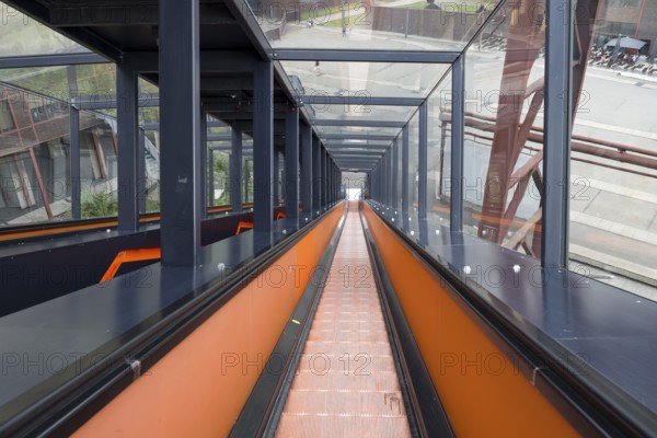 Orange escalator descending, visitor centre, Ruhr Museum, Zeche Zollverein, UNESCO World Heritage Site, Route of Industrial Heritage, Essen, Ruhr area, North Rhine-Westphalia, Germany