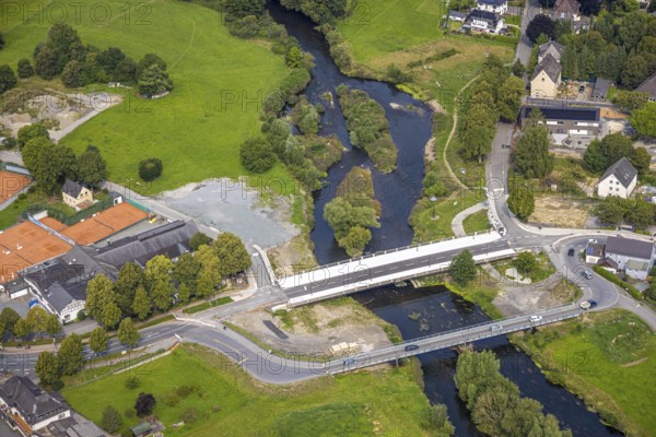 Aerial view, temporary bridge and construction site with new construction of the Dinscheder Ruhrbrücke Glösinger Straße (L735) over the river Ruhr, above St. Sebastianus Schützenbruderschaft 1766 e.V. Öventrop Schützenhalle, Glösingen, Arnsberg, Ruhr area, North Rhine-Westphalia, Germany, construction work, construction area, building site, building plots, construction project, construction site, bridge, DE, Europe, aerial view, aerial photography, aerial photography, new construction, overview, bird's-eye view, overview