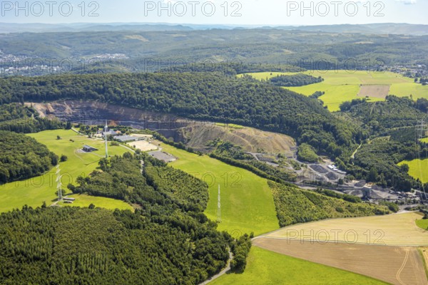 Aerial view, quarry Lanwehr Naturstein GmbH Am Langen Stück, Reit- und Fahrverein Arnsberg und Umgebung e.V. Wicheler Höhe, windmill in a meadow, Müschede, Arnsberg, Ruhr area, North Rhine-Westphalia, Germany, DE, Europe, aerial view, aerial photography, aerial photography, equestrian sports, equestrian centre, equestrian centre, equestrian centre, riding stable, riding club, quarry, overview, bird's eye view, overview