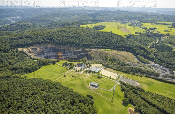 Aerial view, quarry Lanwehr Naturstein GmbH Am Langen Stück, Reit- und Fahrverein Arnsberg und Umgebung e.V. Wicheler Höhe, windmill in a meadow, Müschede, Arnsberg, Ruhr area, North Rhine-Westphalia, Germany, DE, Europe, aerial view, aerial photography, aerial photography, equestrian sports, equestrian centre, equestrian centre, equestrian centre, riding stable, riding club, quarry, overview, bird's eye view, overview