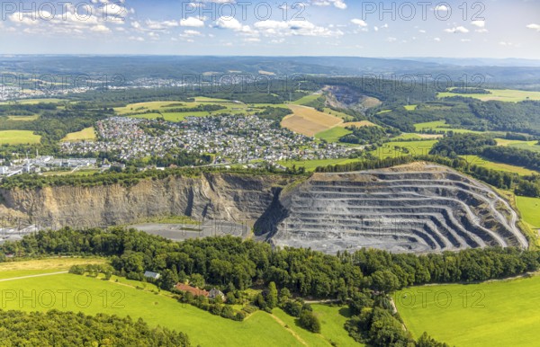 Aerial view, Heinrich Ebel GmbH quarry, Habbel plant, Habbeler Bach, residential area, Müschede district, Müschede, Arnsberg, Ruhr area, North Rhine-Westphalia, Germany, DE, Europe, property tax, real estate, aerial view, aerial photography, aerial photography, quarry, overview, bird's-eye view, residential complex, housing and living, residential area, quality of life, residential neighbourhood, housing estate, residential district, bird's-eye view, overview