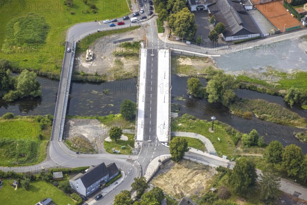 Aerial view, temporary bridge and construction site with new construction of the Dinscheder Ruhrbrücke Glösinger Straße (L735) over the river Ruhr and renaturalisation, Glösingen, Arnsberg, Sauerland, North Rhine-Westphalia, Germany, architecture, construction work, construction area, building site, building plots, construction measure, construction project, construction site, construction site vehicles, temporary bridge, bridge, bridge construction, bridge construction, bridge renovation, DE, Dinscheder Ruhrbrücke, Europe, river, river Ruhr, Glösinger Straße, Hochsauerlandkreis, infrastructure, infrastructure development, engineering, L735, landscape, aerial view, aerial photography, aerial photography, nature, new construction, region, renaturation, Ruhr area, urban development, road construction, technology, overview, environment, traffic, bird's-eye view, water body, birds-eyes view, German city, modern technology, overview, public works