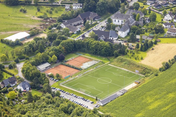 Aerial view, football stadium TUS Rumbeck and tennis courts Mescheder Straße, Rumbeck, Arnsberg, Ruhr area, North Rhine-Westphalia, Germany, DE, Europe, football pitch, football stadium, football club, aerial view, aerial photography, aerial photography, sports, sports facilities, sports field, sports venue, stadium, tennis, tennis facility, tennis courts, tennis club, overview, bird's-eye view, bird's-eye view, overview