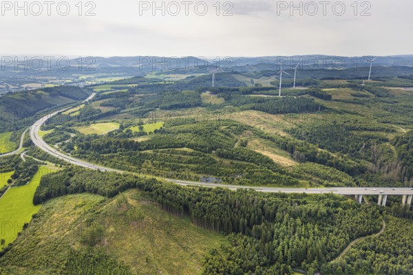 Aerial view, forest area with forest damage and wind turbines, motorway A46 with Freienohl junction, Freienohl, Meschede, Ruhr area, North Rhine-Westphalia, Germany, Arnsberg, DE, Europe, aerial view, aerial photography, aerial photography, road traffic, overview, bird's-eye view, overview