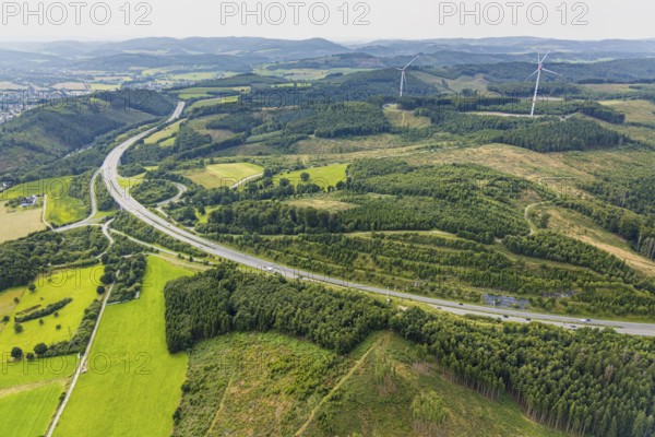Aerial view, forest area with forest damage and wind turbines, motorway A46 with Freienohl junction, Freienohl, Meschede, Ruhr area, North Rhine-Westphalia, Germany, Arnsberg, DE, Europe, aerial view, aerial photography, aerial photography, road traffic, overview, bird's-eye view, overview