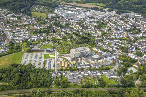 Aerial view, Alexianer Klinikum Hochsauerland - Karolinen-Hospital Hüsten, catholic cemetery St. Petri, Hüsten, Arnsberg, Ruhr area, North Rhine-Westphalia, Germany, burial site, DE, Europe, cemetery, memorial, health care, cemetery, graves, cemetery, hospital, clinic, clinic, hospital, hospital, aerial photograph, aerial photography, aerial photography, medical facility, medical aid, resting place, overview, bird's eye view, birds-eyes view, overview, medical care
