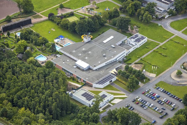 Aerial view, Freizeitbad Naß Arnsberg adventure pool, indoor and outdoor pool, left the graduation house, Hüsten, Arnsberg, Ruhr area, North Rhine-Westphalia, Germany, bathing establishment, bathing resort, DE, Europe, outdoor pool, leisure activities, indoor pool, aerial view, aerial photography, aerial photography, swimming pool, swimming pool, overview, bird's-eye view, overview