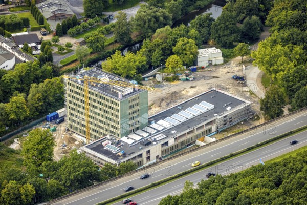 Aerial view, Arnsberg town hall on the A46 motorway, construction site with new building, Neheim, Arnsberg, Ruhr area, North Rhine-Westphalia, Germany, construction work, construction area, building site, building plots, construction project, building site, authority, community centre, DE, Europe, aerial view, aerial photography, aerial photography, new building, town hall, town administration, overview, bird's-eye view, overview