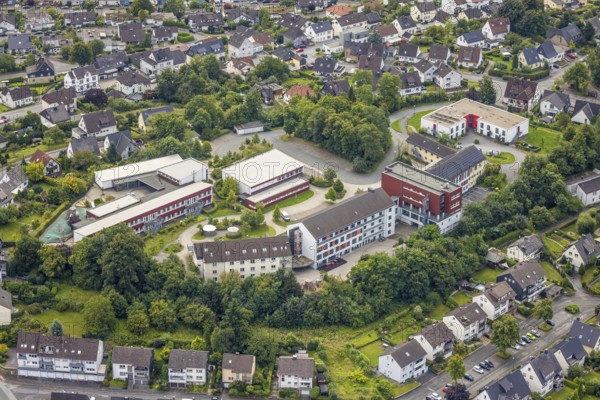 Aerial view, Franz-Joseph-Koch-School and Mariannhill School, right St. Elisabet Caritas retirement home and Caritas Mariannhill residential home, Obereimer, Arnsberg, Ruhr area, North Rhine-Westphalia, Germany, retirement home, nursing home, care and nursing, education, educational institution, DE, Europe, special school, teaching institute, aerial view, aerial photography, aerial photography, care facility, school, retirement home, retirement residence, retirement home, retirement centre, overview, bird's eye view, bird's eye view, overview