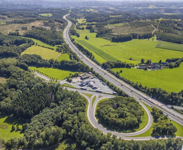 Aerial view, motorway A45 and junction Drolshagen with state road L708, with tankpool24 petrol station, hilly landscape, Germinghausen, Drolshagen, Sauerland, North Rhine-Westphalia, Germany, DE, Europe, aerial view, aerial photography, aerial photography, Ruhr area, road traffic, overview, bird's-eye view, overview