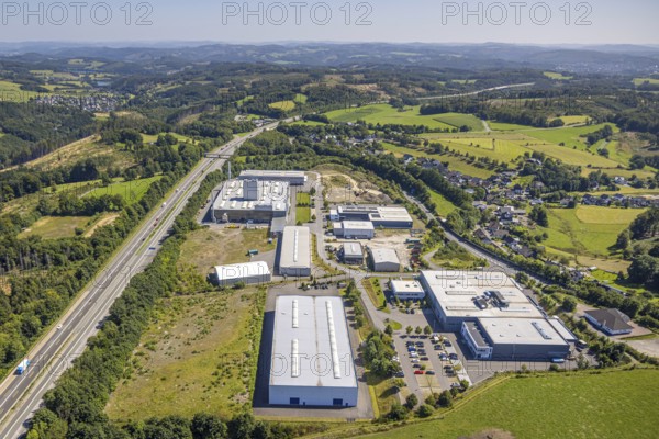 Aerial view, industrial area Buchholz at the motorway A45 and state road L708, hilly landscape, Germinghausen, Drolshagen, Sauerland, North Rhine-Westphalia, Germany, motorway, DE, Europe, aerial view, aerial photography, aerial photography, Ruhr area, road traffic, overview, bird's-eye view, overview
