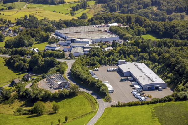 Aerial view, commercial area Alte Dorfstraße with Josef Heuel GmbH logistics and Hermes depot, Germinghausen, Drolshagen, Sauerland, North Rhine-Westphalia, Germany, DE, Europe, commercial enterprises, commercial area, commercial property, commercial site, commercial use, industrial area, industrial site, aerial photograph, aerial photography, aerial photography, Ruhr area, overview, bird's eye view, birds-eyes view, overview