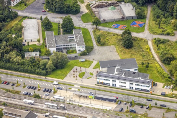 Aerial view, Sauerland-Hellweg-Kolleg SHK and Kolping-Bildungszentren Südwestfalen GmbH - Arnsberg site, Arnsberg Neheim-Hüsten station, Hüsten, Arnsberg, Ruhr area, North Rhine-Westphalia, Germany, railway premises, station, station forecourt, platform, vocational school, education, educational institution, DE, Deutsche Bahn AG, Europe, track systems, tracks, educational institute, aerial view, aerial photography, aerial photography, school, overview, bird's eye view, birds-eyes view, overview