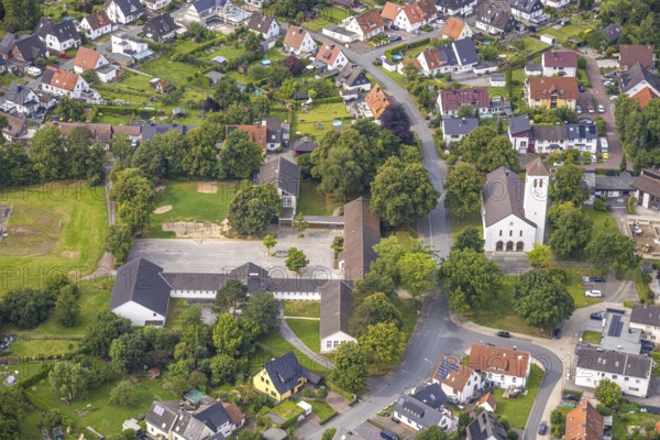 Aerial view, St Joseph's Catholic Church, St Joseph's Catholic Primary School, Bergheim, Bergheim, Arnsberg, Ruhr area, North Rhine-Westphalia, Germany, place of worship, education, educational institution, DE, Europe, religious community, place of worship, primary school, holy place, church, parish, denomination, educational institute, aerial view, aerial photography, aerial photography, religion, religious site, school, overview, bird's eye view, birds-eyes view, overview