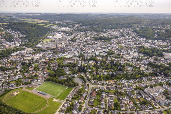 Aerial view, residential area, local view district Neheim, with sports centre Binnerfeld football stadium, Arnsberg, Ruhr area, North Rhine-Westphalia, Germany, DE, Europe, football pitch, football stadium, property tax, real estate, aerial view, aerial photography, aerial photography, sports, sports facilities, sports field, sports facility, stadium, overview, bird's eye view, residential complex, living and life, residential area, residential quality, residential quarter, housing estate, residential district, birds-eyes view, overview