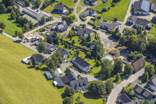 Aerial view, residential area, view of Brachtpe district with construction site, Brachtpe, Drolshagen, Sauerland, North Rhine-Westphalia, Germany, construction work, construction area, building site, building plots, construction project, construction site, DE, Europe, property tax, real estate, landscape, aerial view, aerial photography, aerial photography, new building, Ruhr area, overview, bird's-eye view, meadows and fields, housing estate, housing and living, residential area, residential quality, residential neighbourhood, housing estate, residential district, birds-eyes view, overview