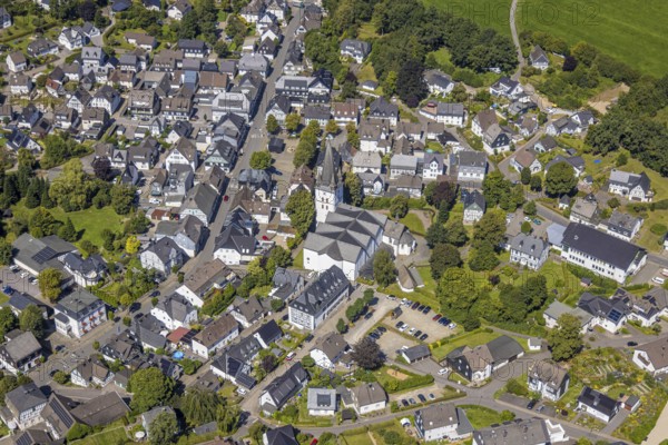 Aerial view, view of the town with St. Clemens Church and Old Monastery Drolshagen, Drolshagen, Sauerland, North Rhine-Westphalia, Germany, place of worship, DE, Europe, religious community, place of worship, property tax, holy place, real estate, church, parish, denomination, aerial view, aerial photography, aerial photography, religion, religious site, Ruhr area, overview, bird's-eye view, residential area, living and life, residential area, quality of life, residential neighbourhood, housing estate, residential area, birds-eyes view, overview