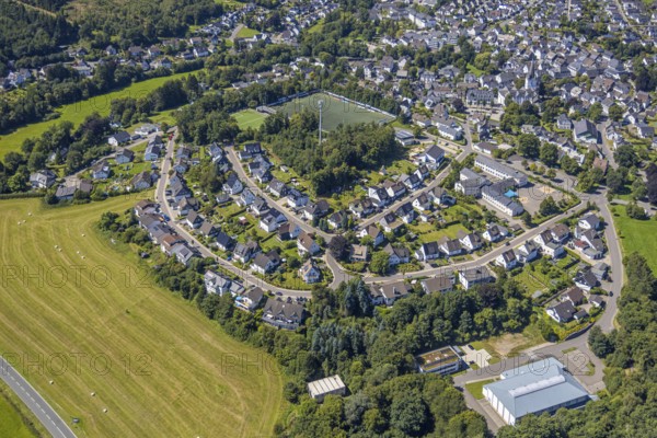 Aerial view, Drolshagen-Ost, single-family house housing estate Am Buscheid, sports facility sports park Am Buscheid with football stadium, Drolshagen, Sauerland, North Rhine-Westphalia, Germany, DE, Europe, property tax, real estate, aerial view, aerial photography, aerial photography, Ruhr area, overview, bird's-eye view, housing estate, housing and living, residential area, housing quality, residential neighbourhood, housing estate, residential area, birds-eyes view, overview