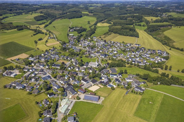 Aerial view, residential area, local view, Iseringhausen district and hilly landscape, Iseringhausen, Drolshagen, Sauerland, North Rhine-Westphalia, Germany, DE, Europe, property tax, real estate, aerial view, aerial photography, aerial photography, Ruhr area, overview, bird's-eye view, residential complex, living and life, residential area, residential quality, residential neighbourhood, housing estate, residential district, birds-eyes view, overview