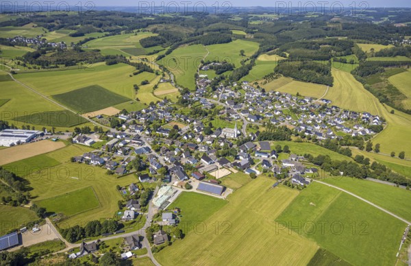 Aerial view, residential area, local view, Iseringhausen district and hilly landscape, Iseringhausen, Drolshagen, Sauerland, North Rhine-Westphalia, Germany, DE, Europe, property tax, real estate, aerial view, aerial photography, aerial photography, Ruhr area, overview, bird's-eye view, residential complex, living and life, residential area, residential quality, residential neighbourhood, housing estate, residential district, birds-eyes view, overview