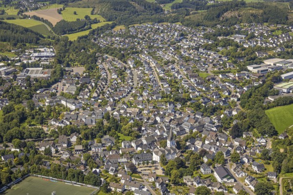 Aerial view, view of the town with St. Clemens Church and Old Monastery Drolshagen, Drolshagen, Sauerland, North Rhine-Westphalia, Germany, place of worship, DE, Europe, religious community, place of worship, property tax, holy place, real estate, church, parish, denomination, aerial view, aerial photography, aerial photography, religion, religious site, Ruhr area, overview, bird's-eye view, residential area, living and life, residential area, quality of life, residential neighbourhood, housing estate, residential area, birds-eyes view, overview