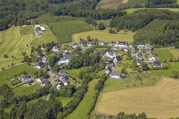 Aerial view, residential area, local view district Sendschotten with pilgrim church St. Michael, Hützemert, Drolshagen, Sauerland, North Rhine-Westphalia, Germany, DE, Europe, property tax, green trees, hilly landscape, real estate, landscape, aerial view, aerial photography, aerial photography, Ruhr area, overview, bird's eye view, forest, meadows and fields, residential area, living and living, residential area, residential quality, residential neighbourhood, housing estate, residential area, birds-eyes view, green forest, overview