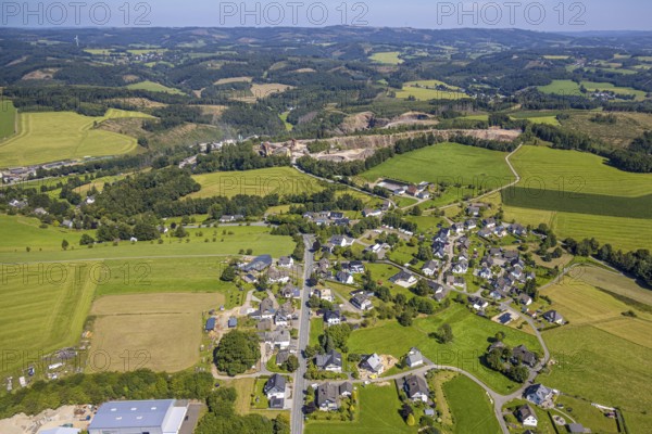 Aerial view, residential area, local view, district Scheda in hilly landscape with distant view, view to the quarry Robert Schulte Steinbruch GmbH, Germinghausen, Drolshagen, Sauerland, North Rhine-Westphalia, Germany, DE, Europe, property tax, real estate, aerial view, aerial photography, aerial photography, Ruhr area, quarry, overview, bird's eye view, residential area, living and living, residential area, residential quality, residential neighbourhood, residential estate, residential district, birds-eyes view, overview