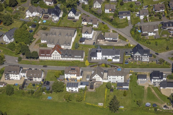 Aerial view, Kath. Verbundgrundschule der Stadt Drolshagen - Teilstandort Schreibershof, catholic church St. Laurentius, Schreibershof, Drolshagen, Sauerland, North Rhine-Westphalia, Germany, place of worship, education, educational institution, DE, Europe, religious community, place of worship, primary school, holy place, church, parish, denomination, educational institute, aerial photograph, aerial photography, aerial photography, religion, religious site, Ruhr area, school, overview, bird's-eye view, birds-eyes view, overview
