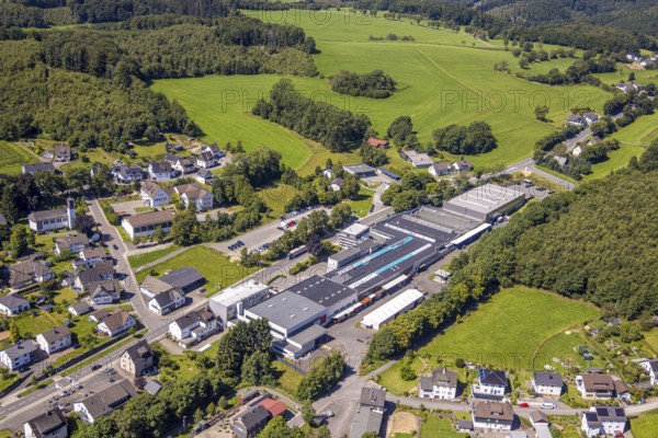 Aerial view, commercial area Hauptstraße with Heinrich Huhn GmbH, primary school Hützemert, forest area with forest damage, Hützemert, Drolshagen, Sauerland, North Rhine-Westphalia, Germany, education, educational institution, DE, Europe, commercial enterprises, commercial area, commercial property, commercial site, commercial use, primary school, industrial area, industrial site, educational institute, aerial photograph, aerial photography, aerial photography, Ruhr area, school, overview, bird's eye view, birds-eyes view, overview