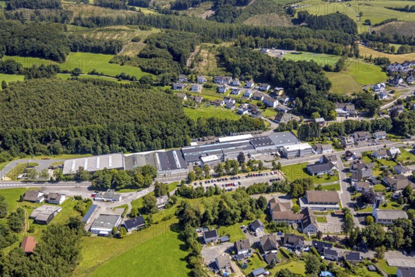 Aerial view, commercial area Hauptstraße with Heinrich Huhn GmbH, primary school Hützemert, forest area with forest damage, Hützemert, Drolshagen, Sauerland, North Rhine-Westphalia, Germany, education, educational institution, DE, Europe, commercial enterprises, commercial area, commercial property, commercial site, commercial use, primary school, industrial area, industrial site, educational institute, aerial photograph, aerial photography, aerial photography, Ruhr area, school, overview, bird's eye view, birds-eyes view, overview