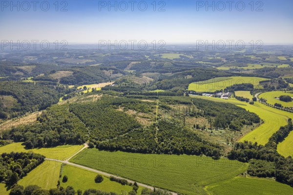 Aerial photograph, Rammskopf forest area, Langenohl GmbH & Co.KG, agricultural business, forest area with forest damage in hilly landscape and distant view, Drolshagen, Sauerland, North Rhine-Westphalia, Germany, tree mortality, DE, Europe, commercial enterprises, commercial area, commercial property, commercial site, commercial use, clear-cutting, calamity areas, landscape, aerial photograph, aerial photography, aerial photography, Ruhr area, overview, bird's-eye view, forest, forest damage, forest mortality, birds-eyes view, overview